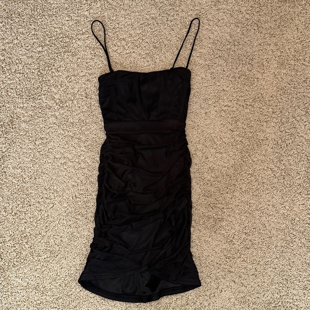 Lucky in the Sky mini black dress.